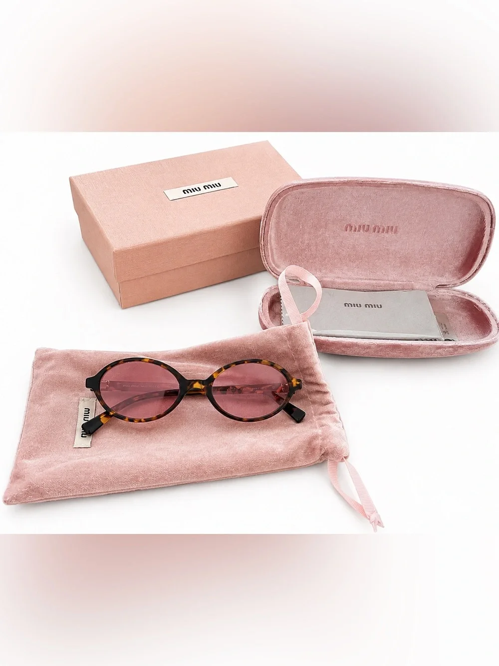 Miu Miu Pink Lens Tortoiseshell Oval Sunglasses